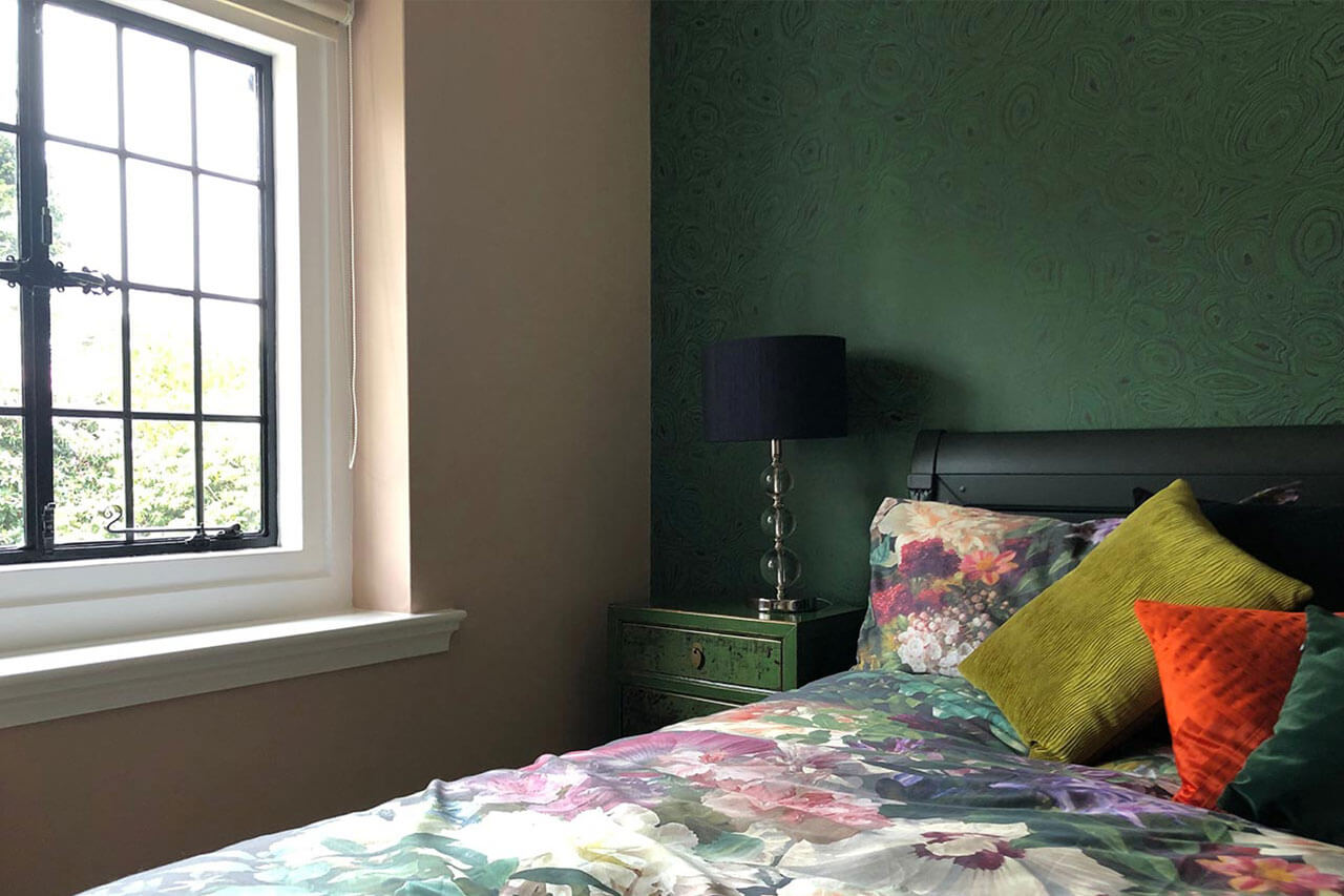 Bed next to a window