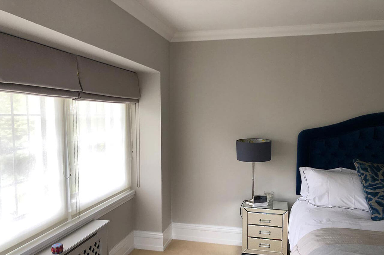 Bed next to a window