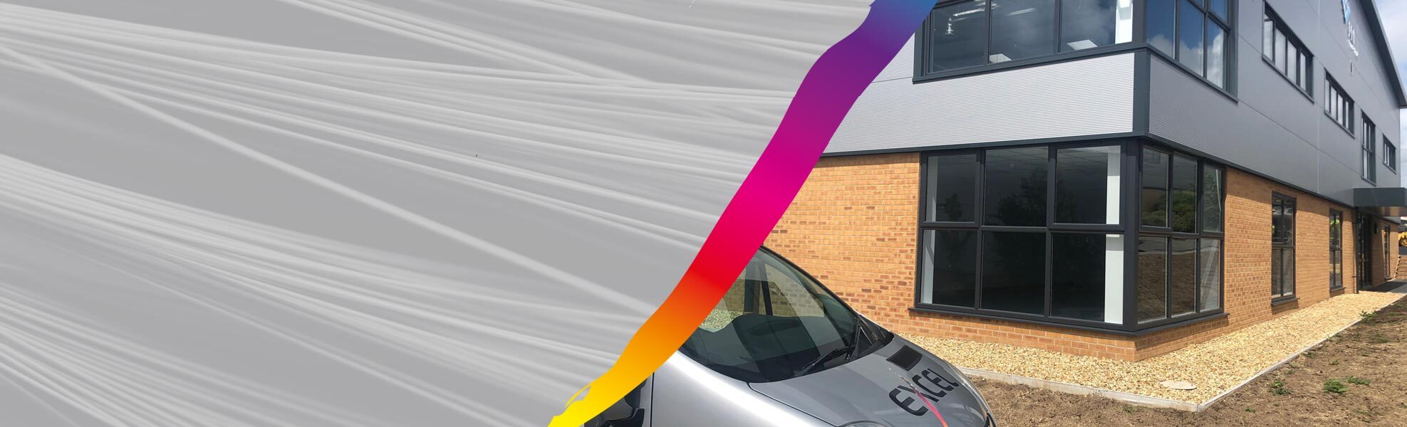 Excel van outside of a building